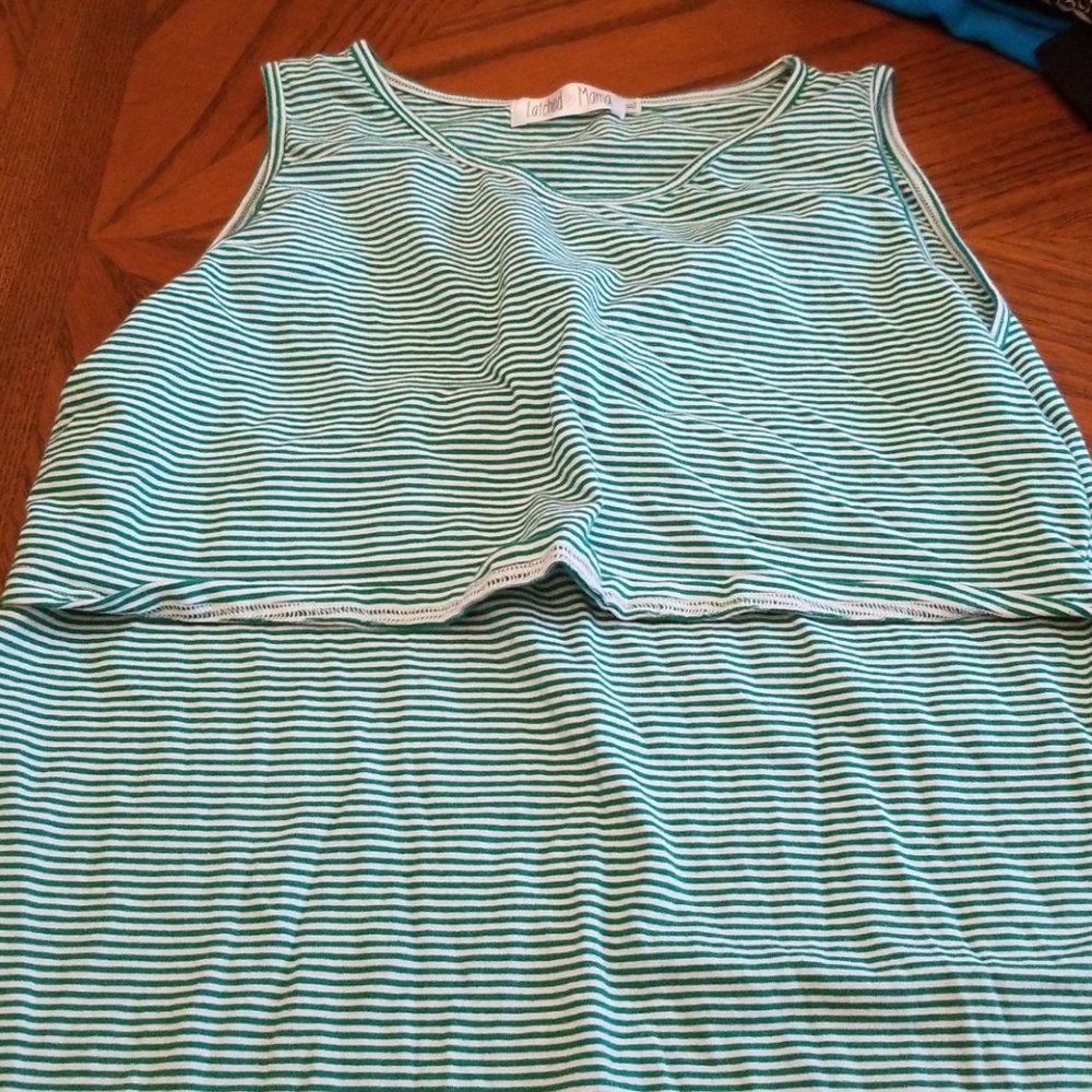 A green and white Latched Mama dress